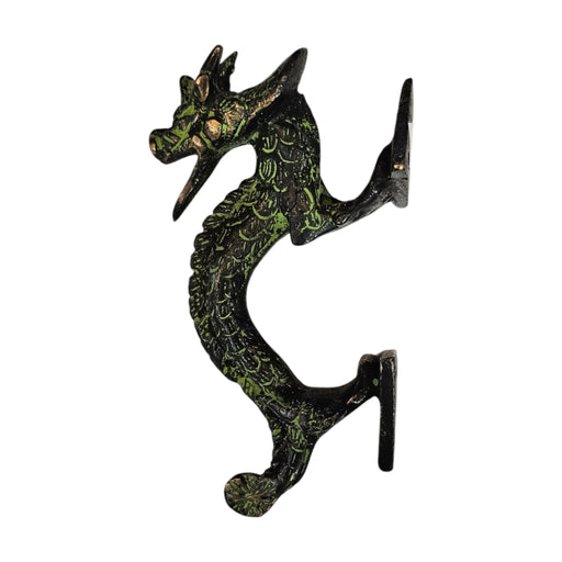 Side iew of an Arched Dragon Green Patina Brass Handle on a white background.