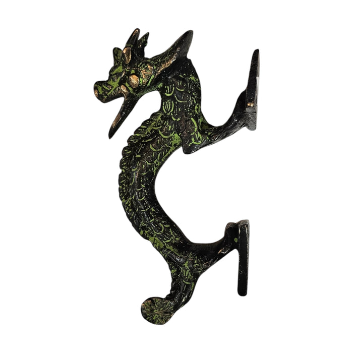 Side iew of an Arched Dragon Green Patina Brass Handle on a white background.