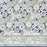 A deep blue, white and green floral tablecloth with the design name Arctic Mandala