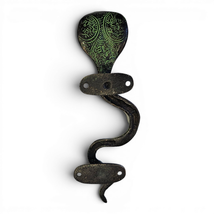 Reverse side of a Cobra Design Green Patina Brass Handle set against a white background