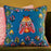 Blue cotton canvas cushion cover with embroidered bug and floral border.  45x45cm.