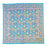 A square turquoise-blue tablecloth with an intricate multicolour floral pattern, featuring yellow, pink, and purple details, laid flat against a white background.