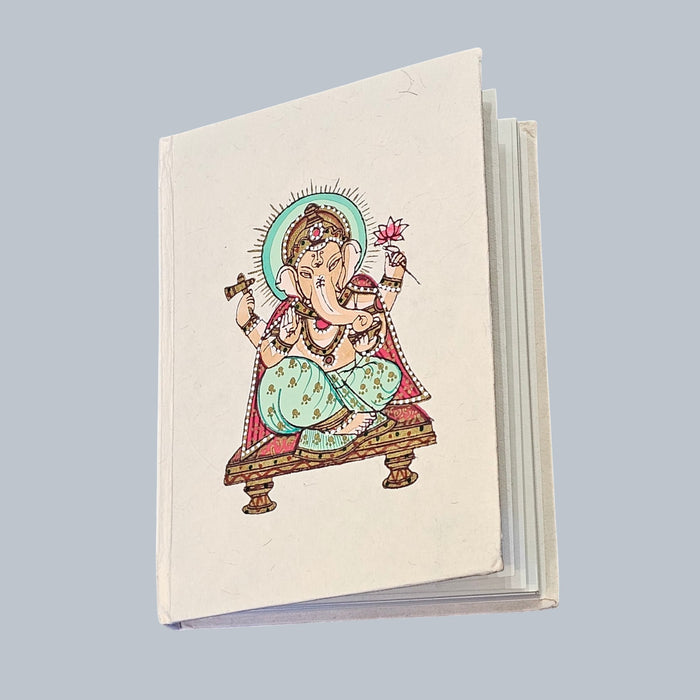 Handmade Ganesh Recycled Paper notebok on a grey background