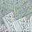 Green Block Print Tablecloth with a Yellow and Blue Floral Motil with the sides folded up