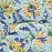 Close up of a Green Block Print Tablecloth with a Yellow and Blue Floral Motil