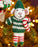Decorative mouse ornament in a green sweater and striped pants, holding a candy cane, on a Christmas tree.
