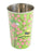 Stainless steel tumbler with bird and floral design on a green background