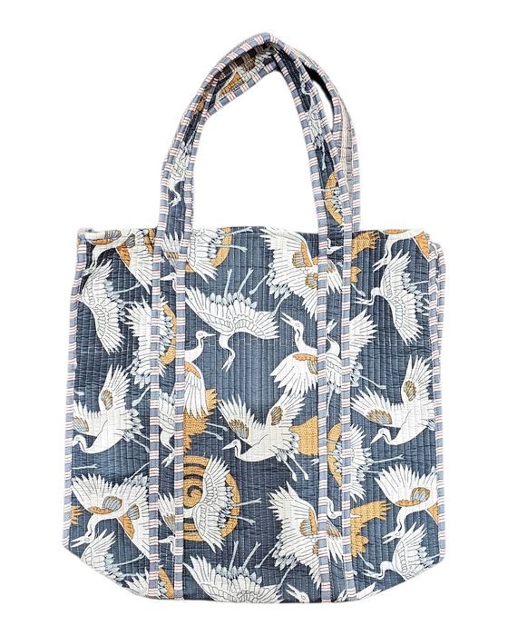 Tote bag with crane pattern on a grey background