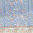Decorative floral pattern with orange and green elements on a blue background