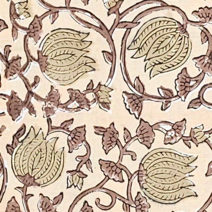 Close up image of a Hand Block Printed Cotton Tablecloth with scrolling vines and Tulip design in a soft brown colour palette