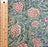 Floral patterned fabric with a ruler for scale on a green background