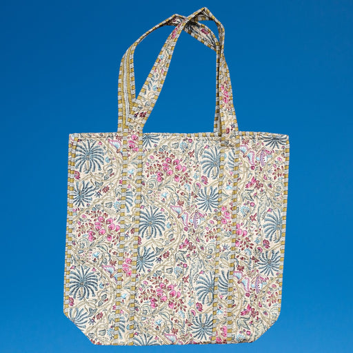 Indian Palm Quilted Cotton Tote Bag on a plain blue background