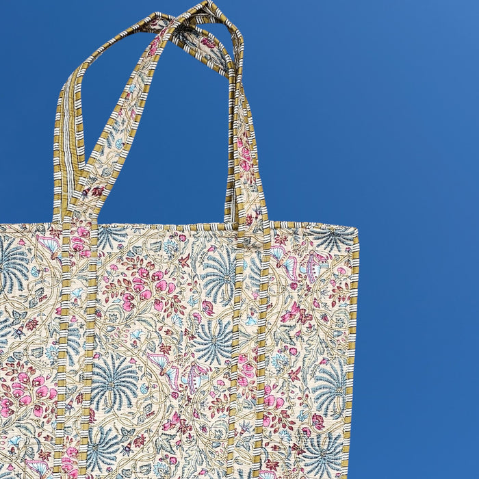 Indian Palm Quilted Cotton Tote Bag Handle against a plain blue background