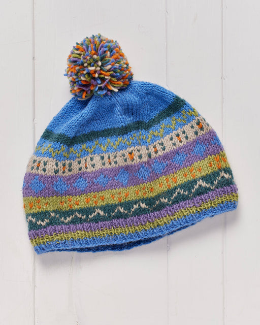 A handknited, fleece lined Kantega Pompom Beanie Hat.