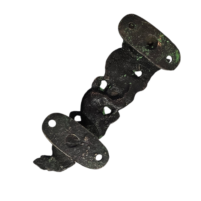 Image showing the reverse side of a Long Dragon Design Green Patina Brass Handle on a white background