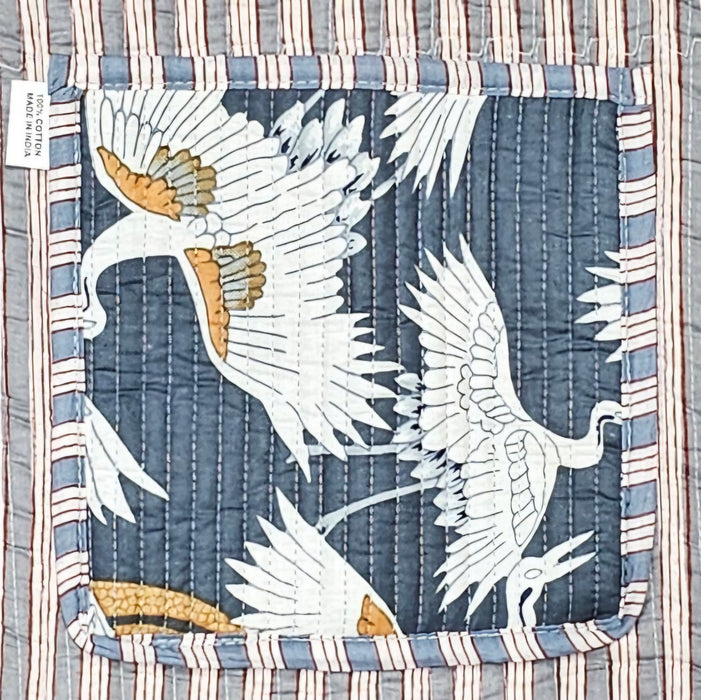 Close up of an internal slip pocket and lining of a cotton quilted tote bag