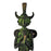 Close up image of a Namaste Figure Green Patina Brass Handle on a white background