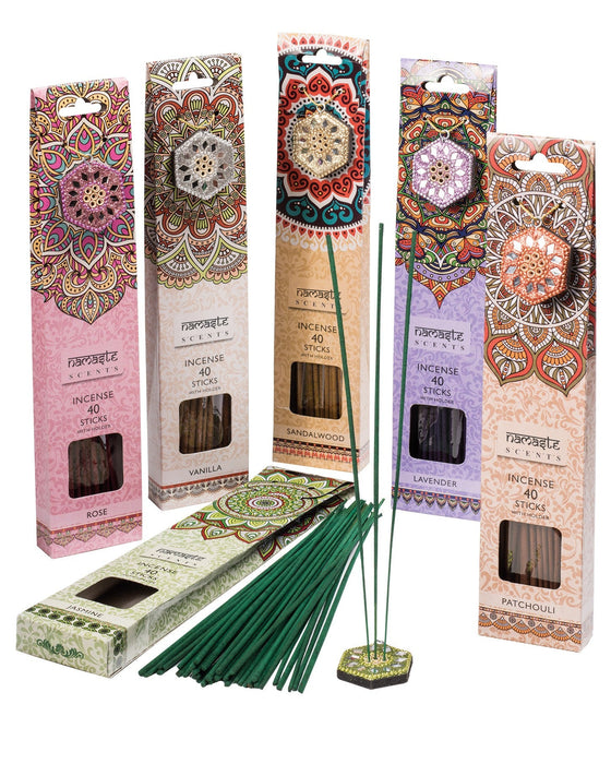 Incense sticks with colourful packaging on a white background.