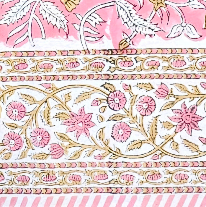 Decorative border with pink flowers and gold patterns on a white background