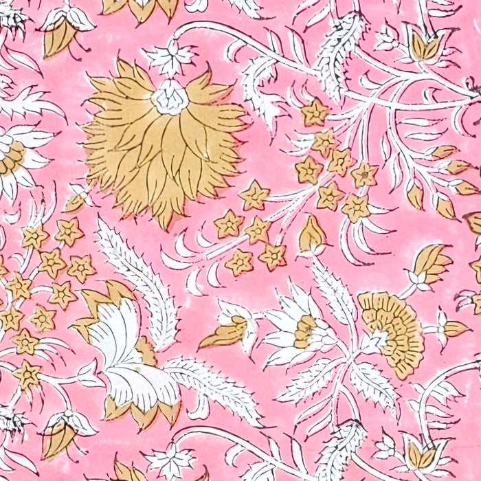 Floral pattern with gold and white colours on a pink background