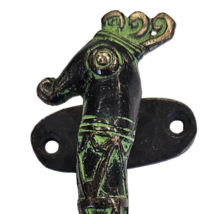 Close up picture of a Sea Horse Design Green Patina Brass Handle on a white background