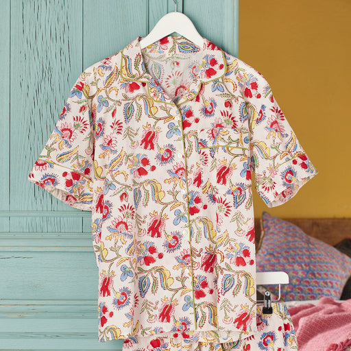 Shvanthi Block Print Short Pyjamas on a hanger against a colourful background