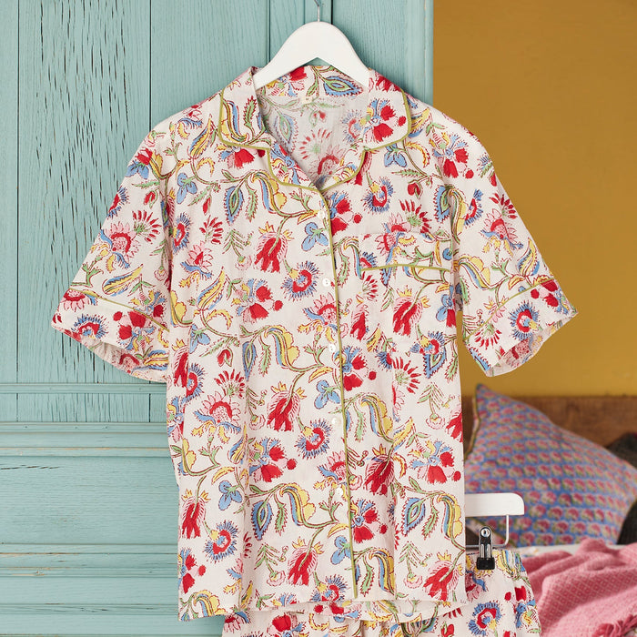 Shvanthi Block Print Short Pyjamas on a hanger against a colourful background