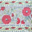 Detailed image of the border of the Handcrafted 100% cotton tablecloth in Slate Garden print, showing crimson red flowers, sage green leaves on a blue-grey background.