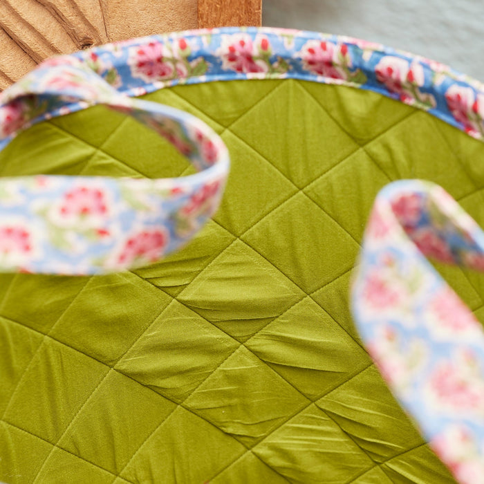 Inside view of Taruni Block Print Storage Laundry Bag showing green quilted lining