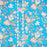 close up etail of a floral pattern on a blue cotton quilted tote bag