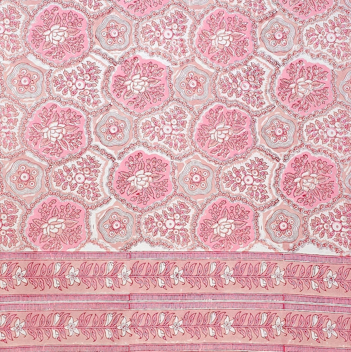 Pink and white floral-patterned tablecloth