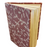 Book with a patterned cover on a light green background